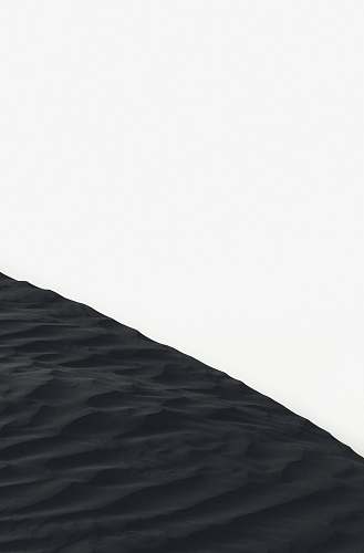sand dune grayscale photo of sand dunes outdoors